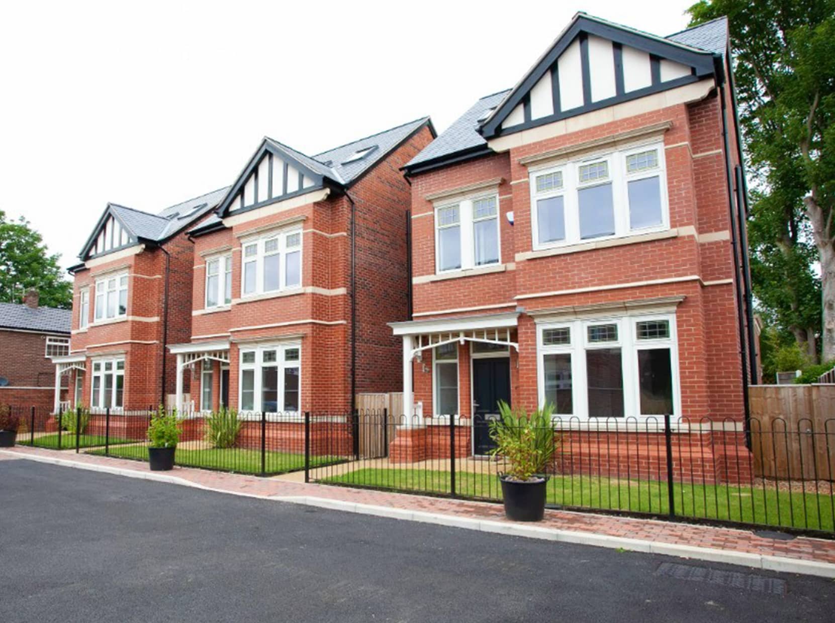 a row of red brick houses.