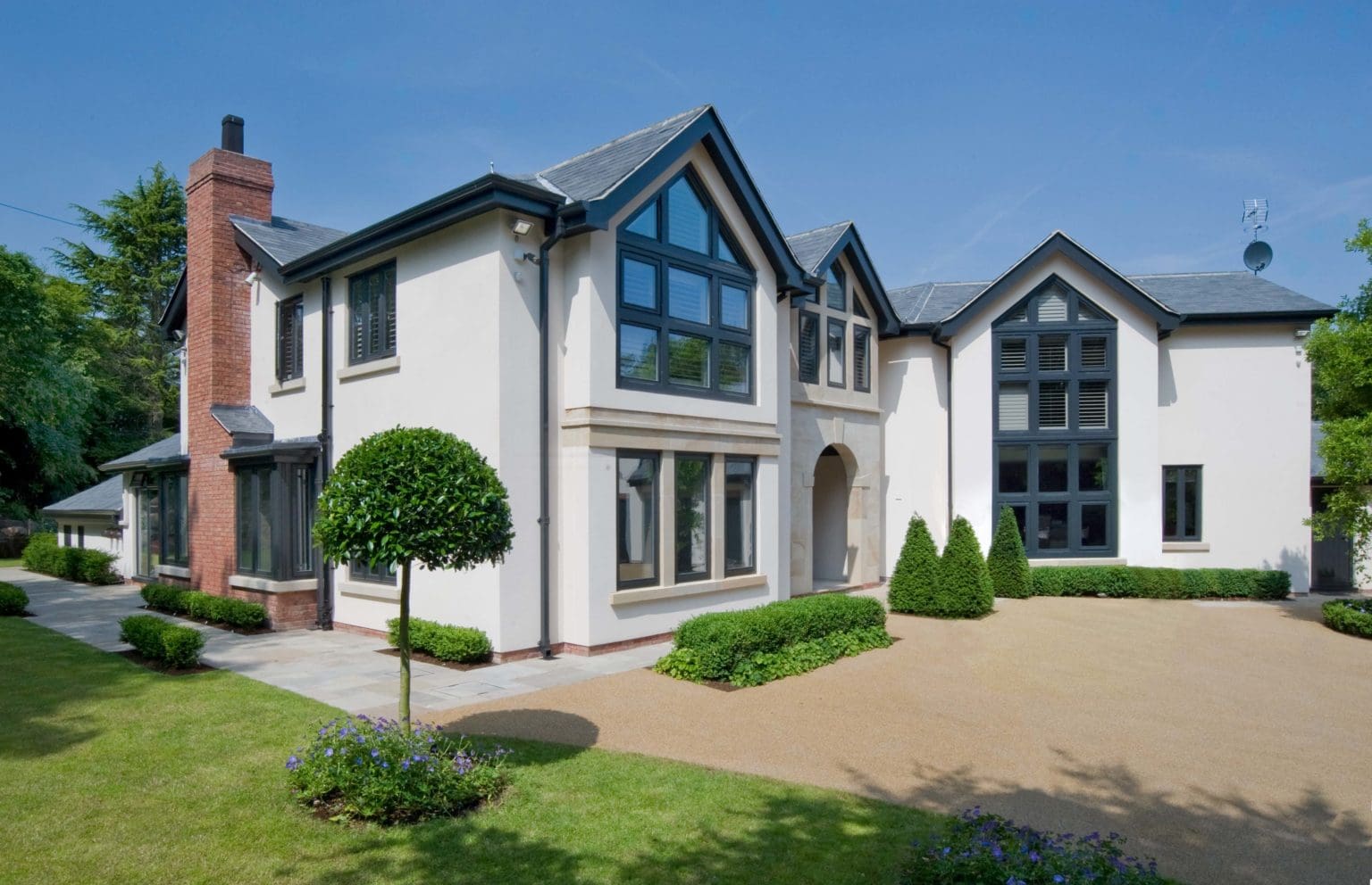 a large white house with a lot of windows.