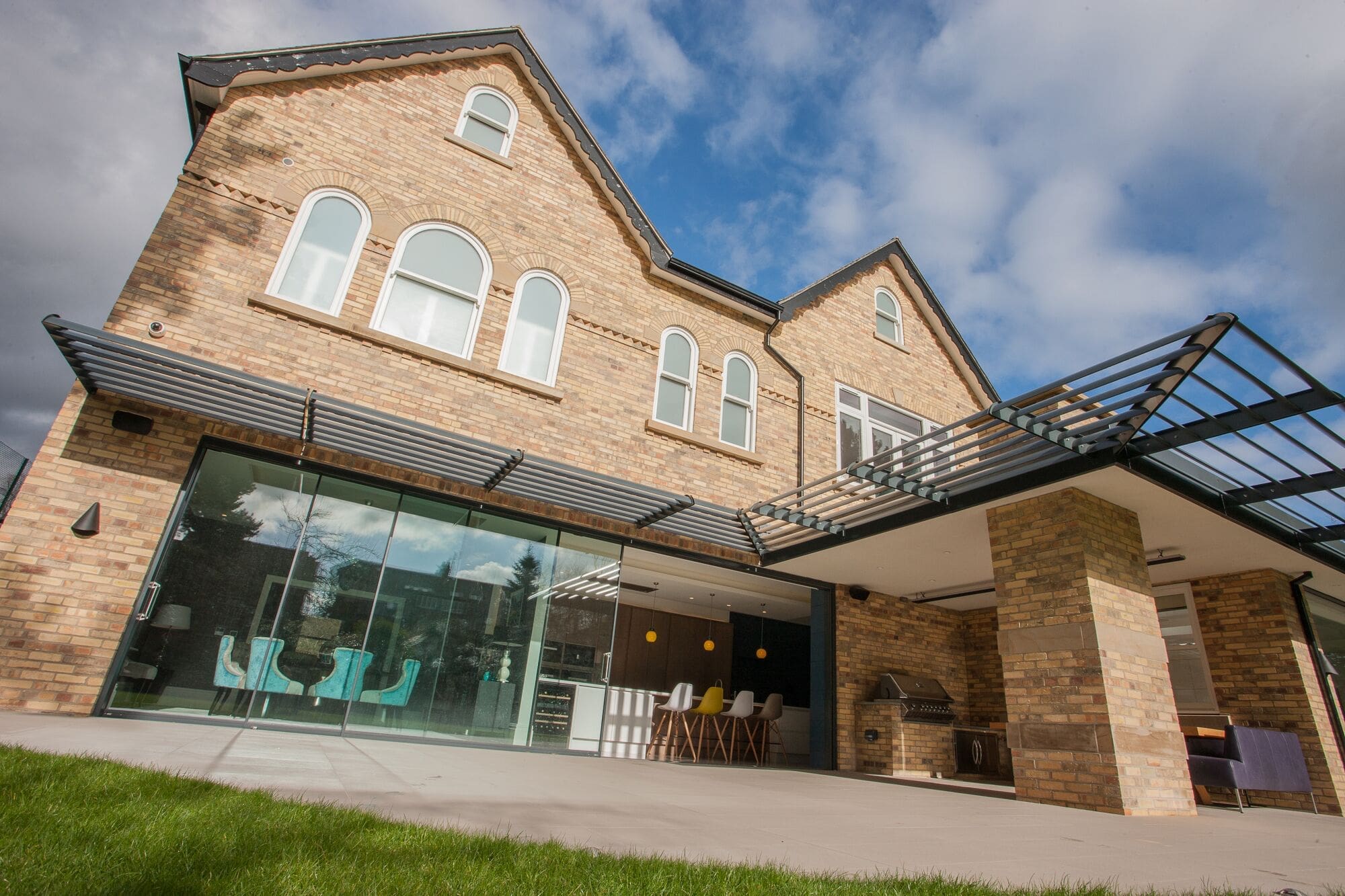 a large brick building with a glass front door.