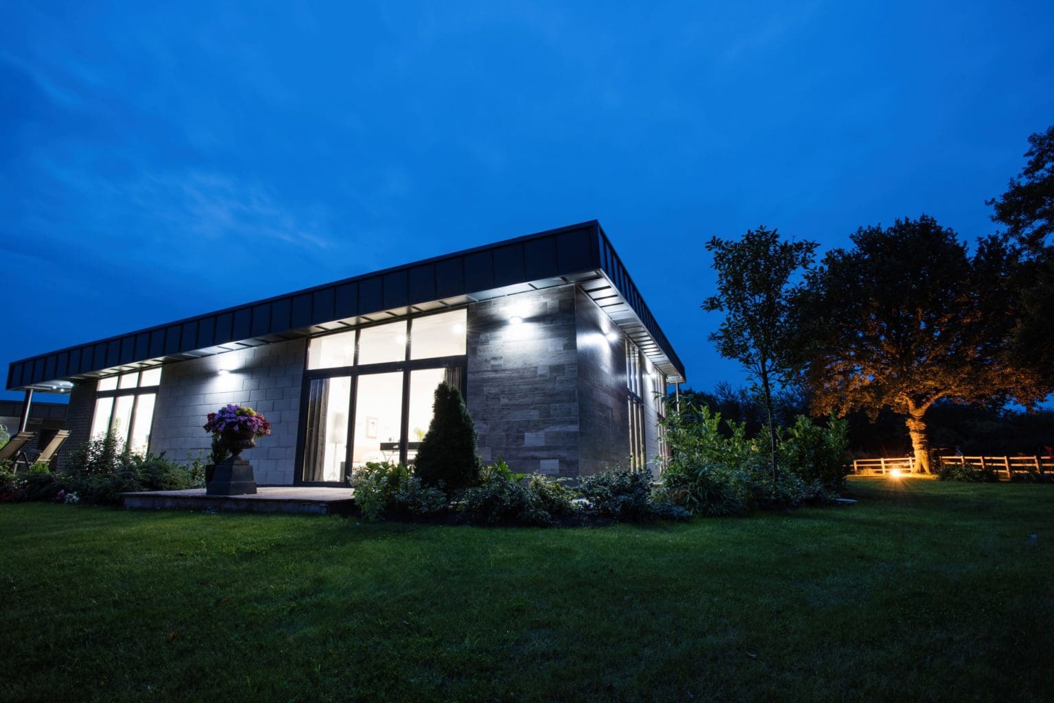 a house that is lit up at night.