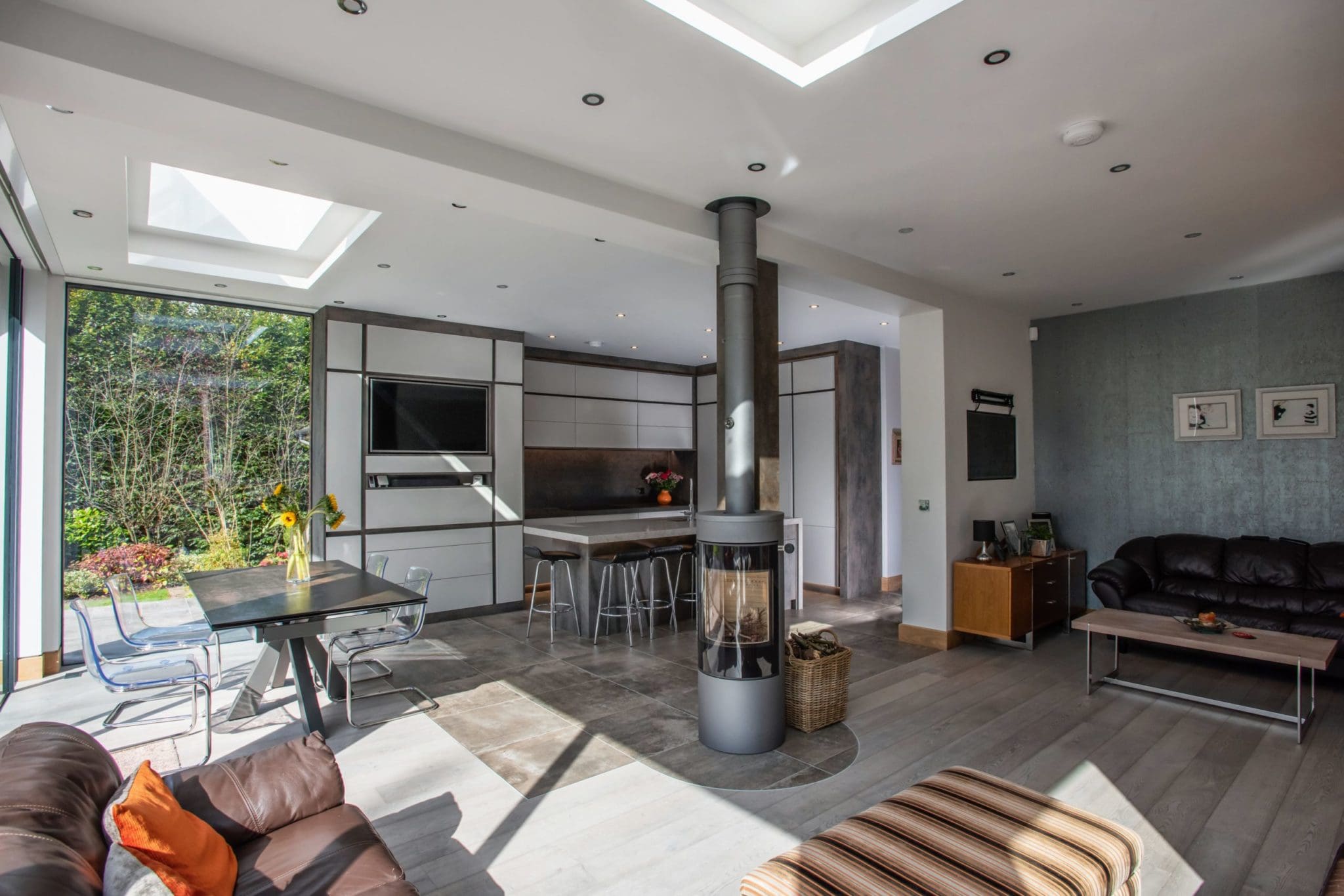 a living room filled with furniture and a fire place.