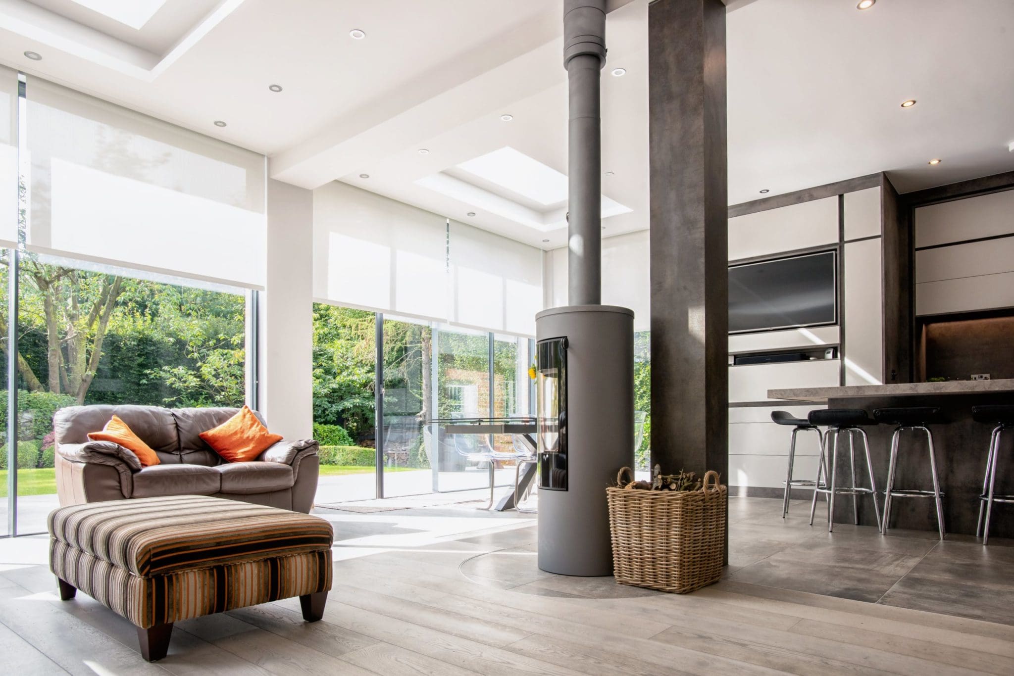 a living room filled with furniture and a fire place.