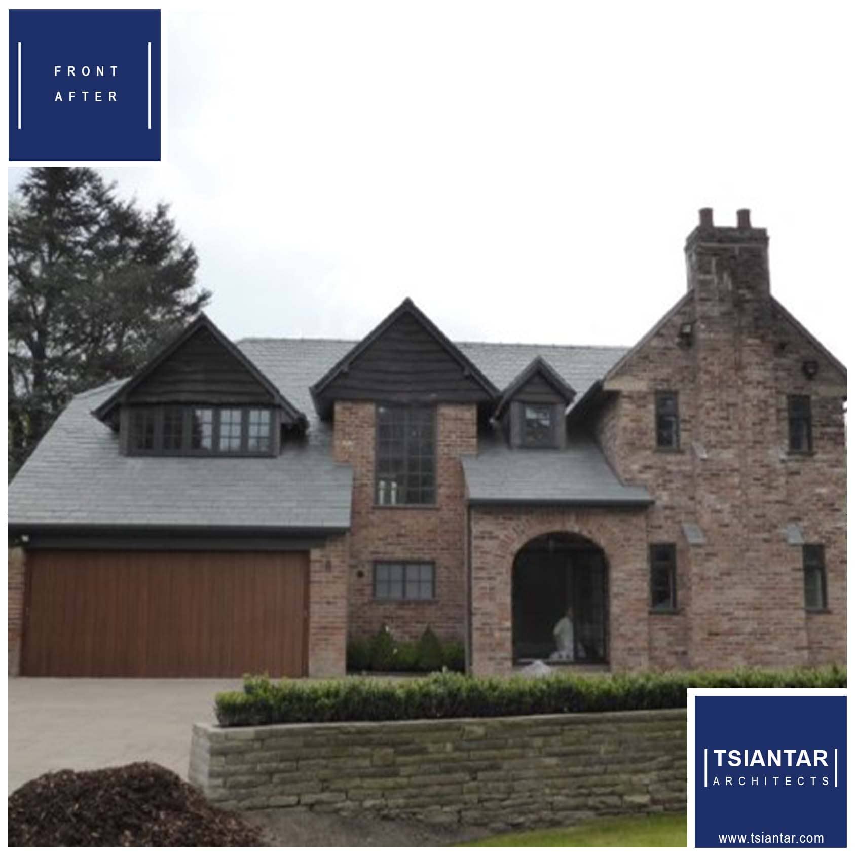 a brick house with a blue sign on it.