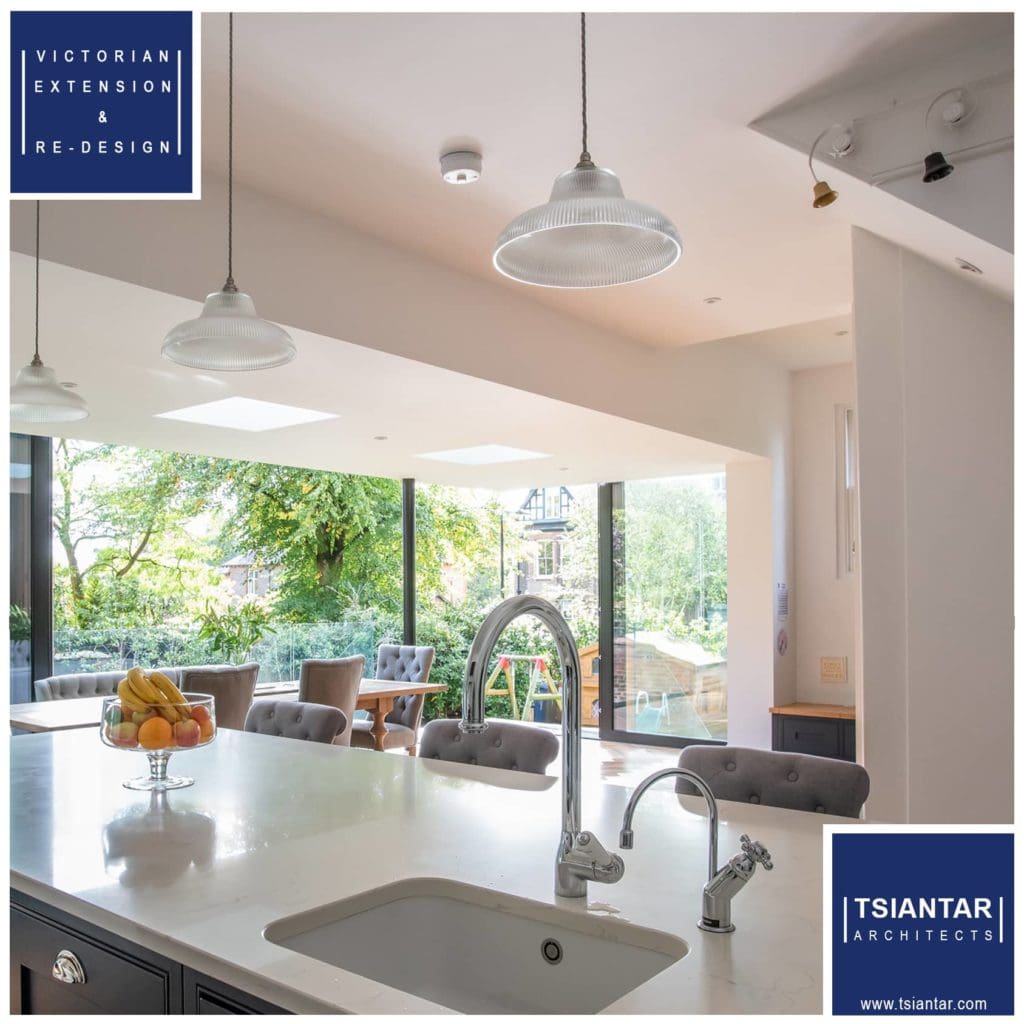 An image of a kitchen with blue lights and a sink.