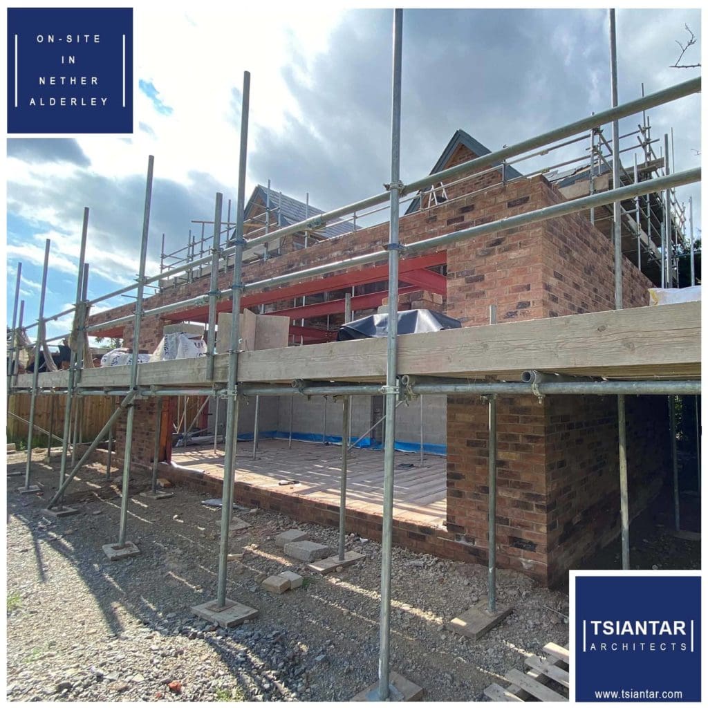 An on-site house in Nether Alderley under construction with scaffolding around it.
