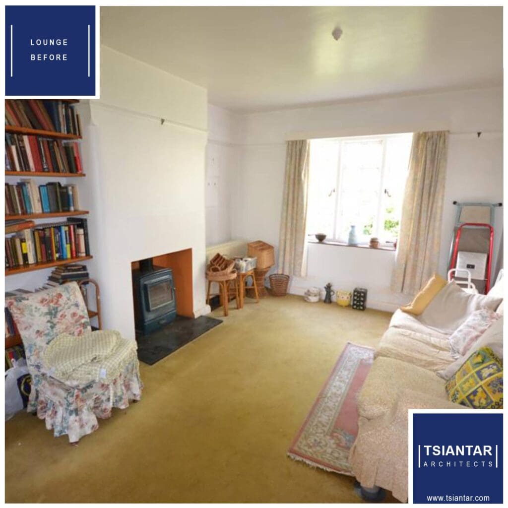 A "before" image of a lounge room awaiting home renovation, featuring dated furniture and decor.