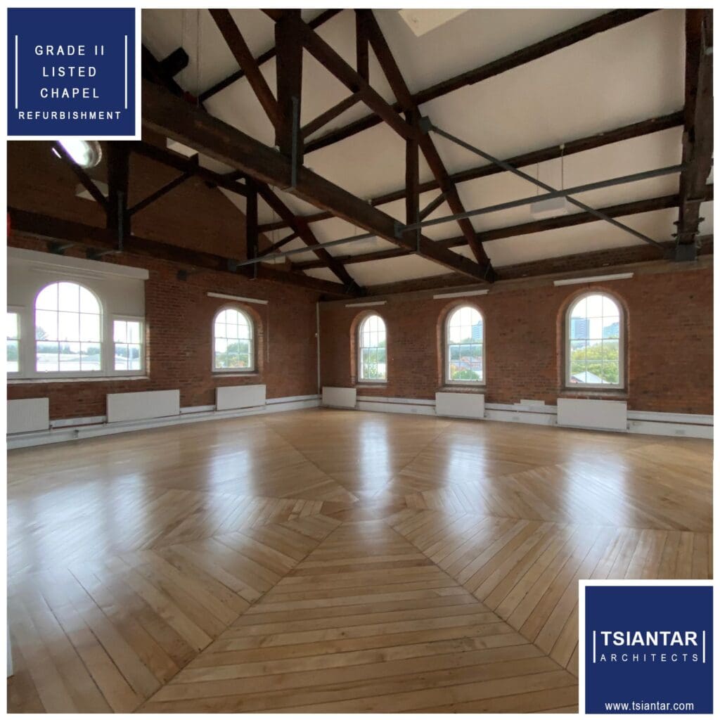Renovated chapel interior with exposed beams, arched windows, and a wooden floor showcases the meticulous chapel renovation.