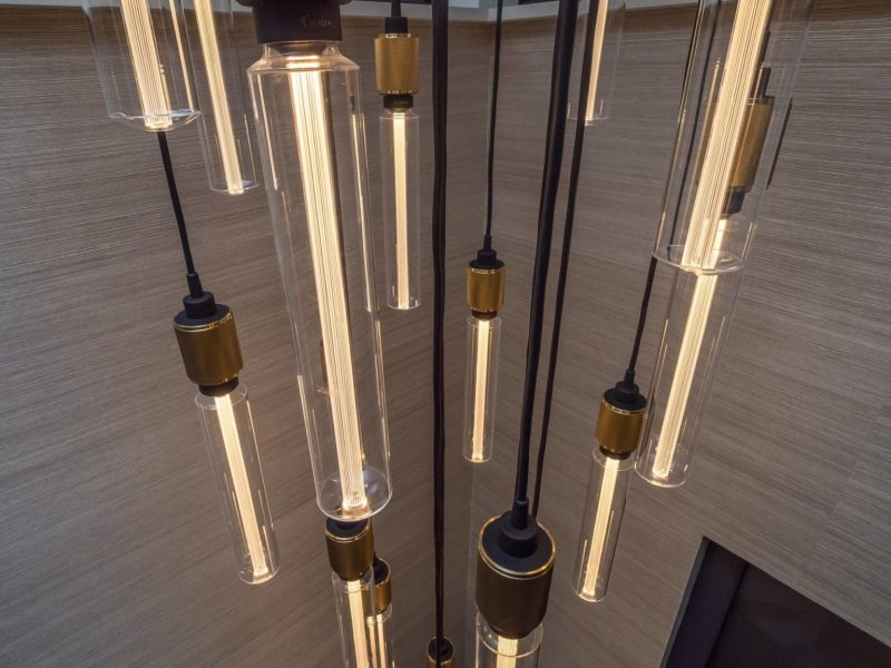 a chandelier with a bunch of lights hanging from it.