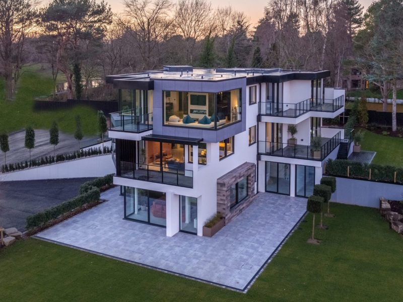 an aerial view of a house with a patio.