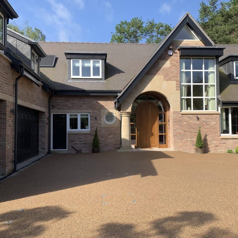 A house with a driveway and garage.